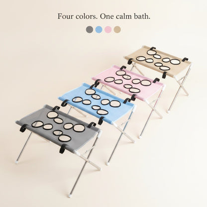 Wash Dock in four colors — charcoal, blue, pink, khaki